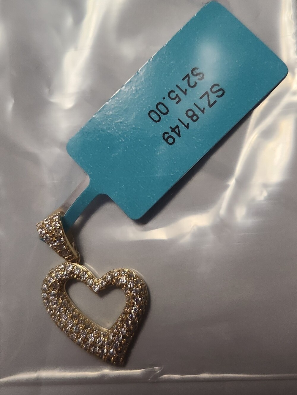 MOISSANITE STERLING SILVER OVER GOLD, 925 HEART PENDANT, 0.63 CTW. COLOR D